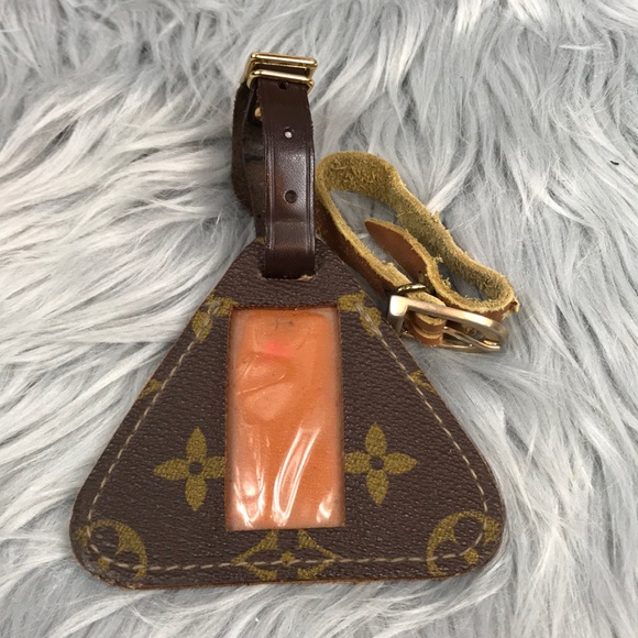 Louis Vuitton Handbags - Louis Vuitton Vintage triangle Luggage Tag
